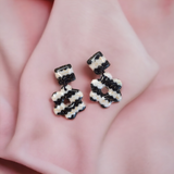 Funky Black and Cream Glitter Flower Wiggle Earrings