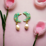 Green crystal effect crescent moon and pearls earrings